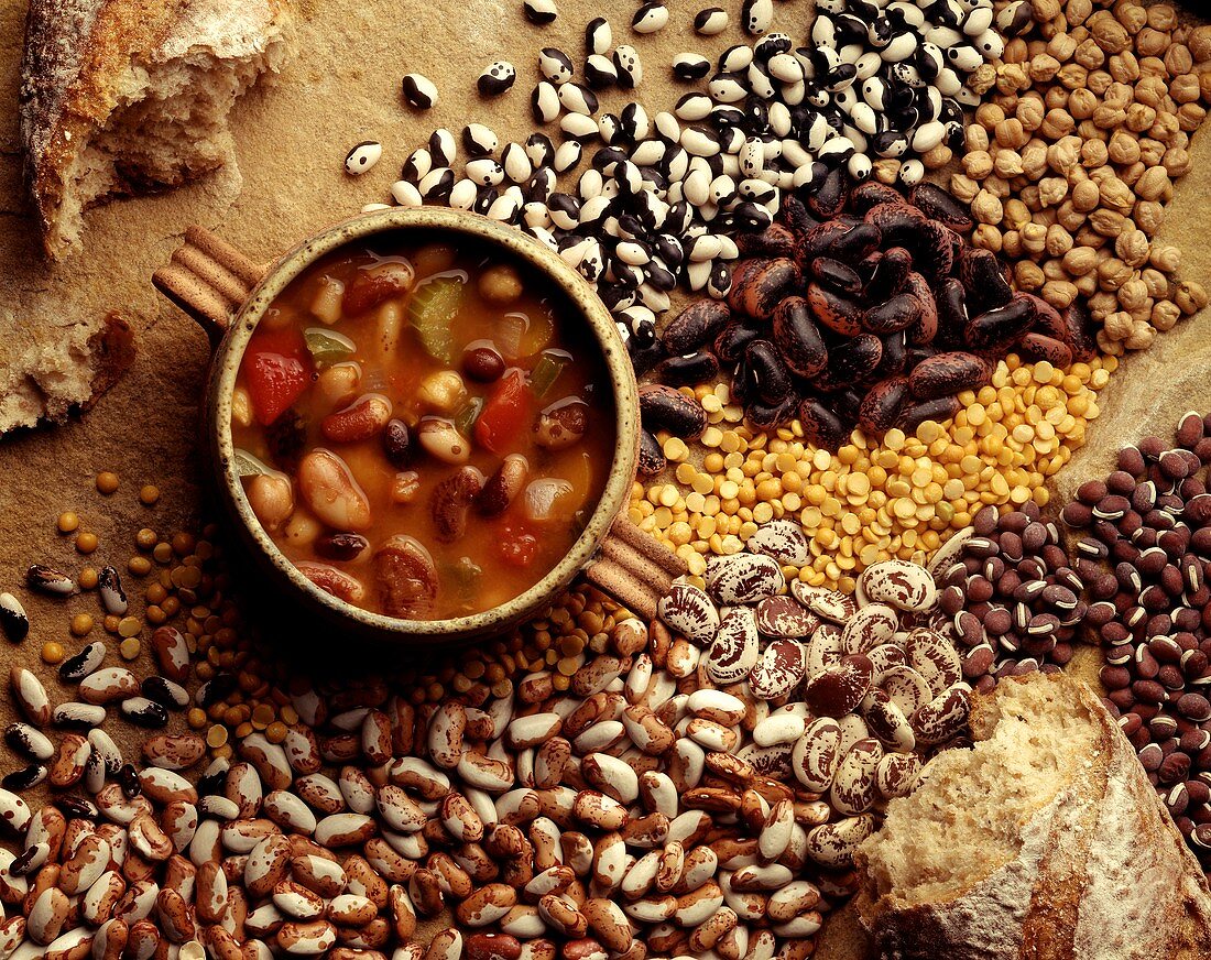 Hearty bean soup, surrounded by beans and lentils