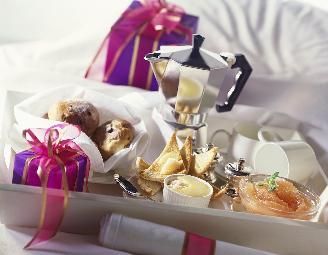 Breakfast tray with espresso and Christmas pastries
