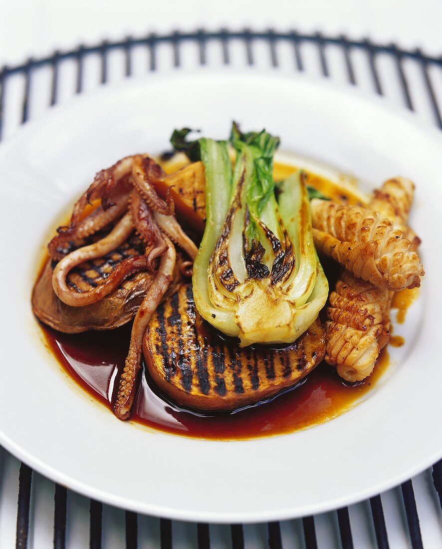 Barbecued kumara (sweet potato) with cuttlefish & pak choi