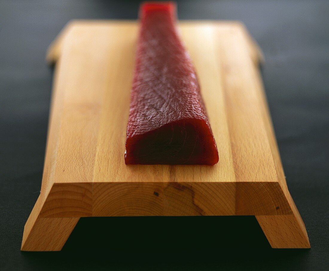 Raw tuna fillet on a sushi board