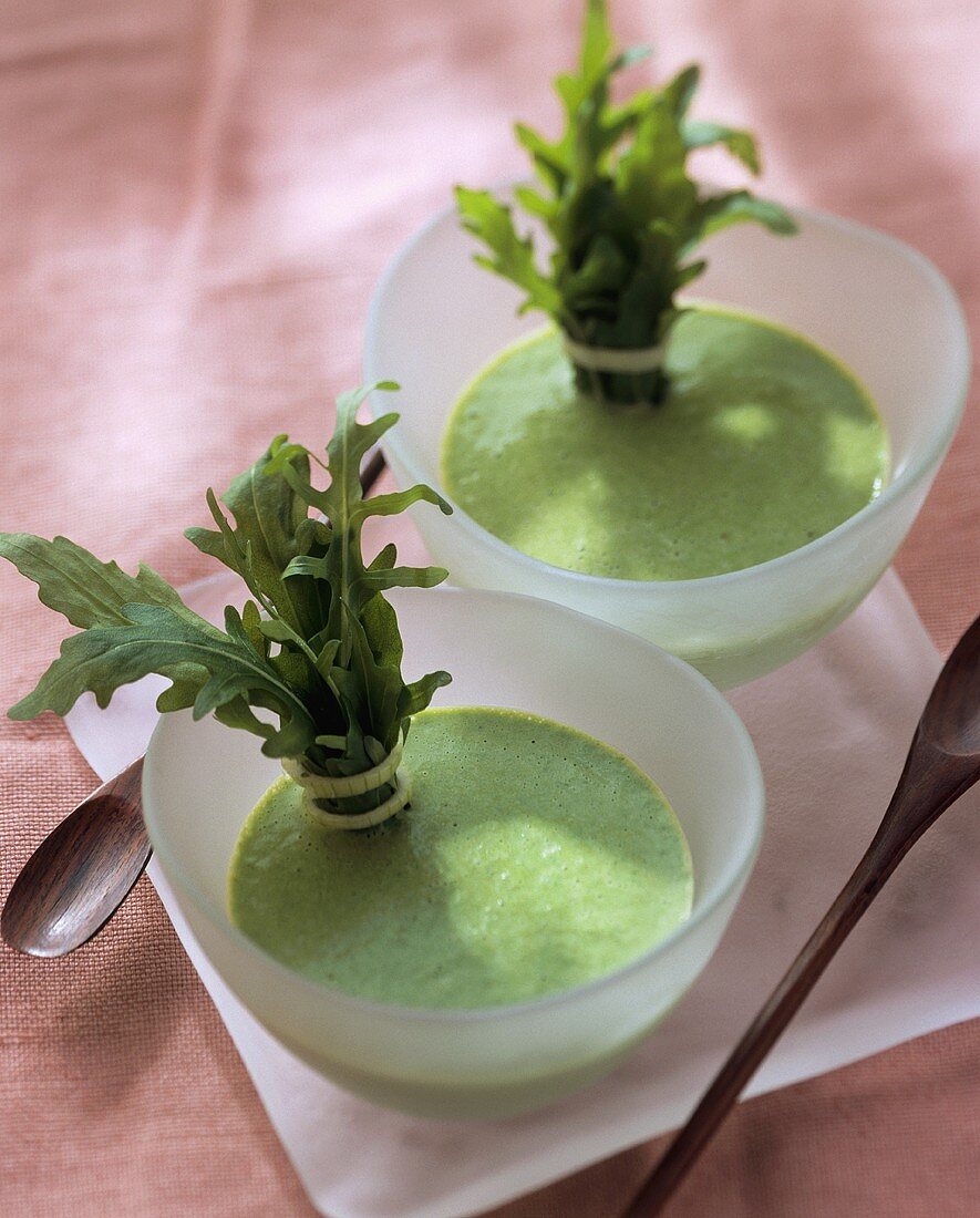 Cream of rocket soup in two bowls