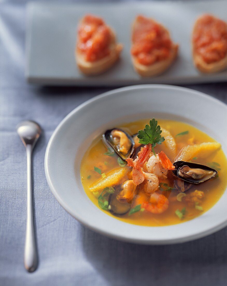 Seafood soup with orange segments