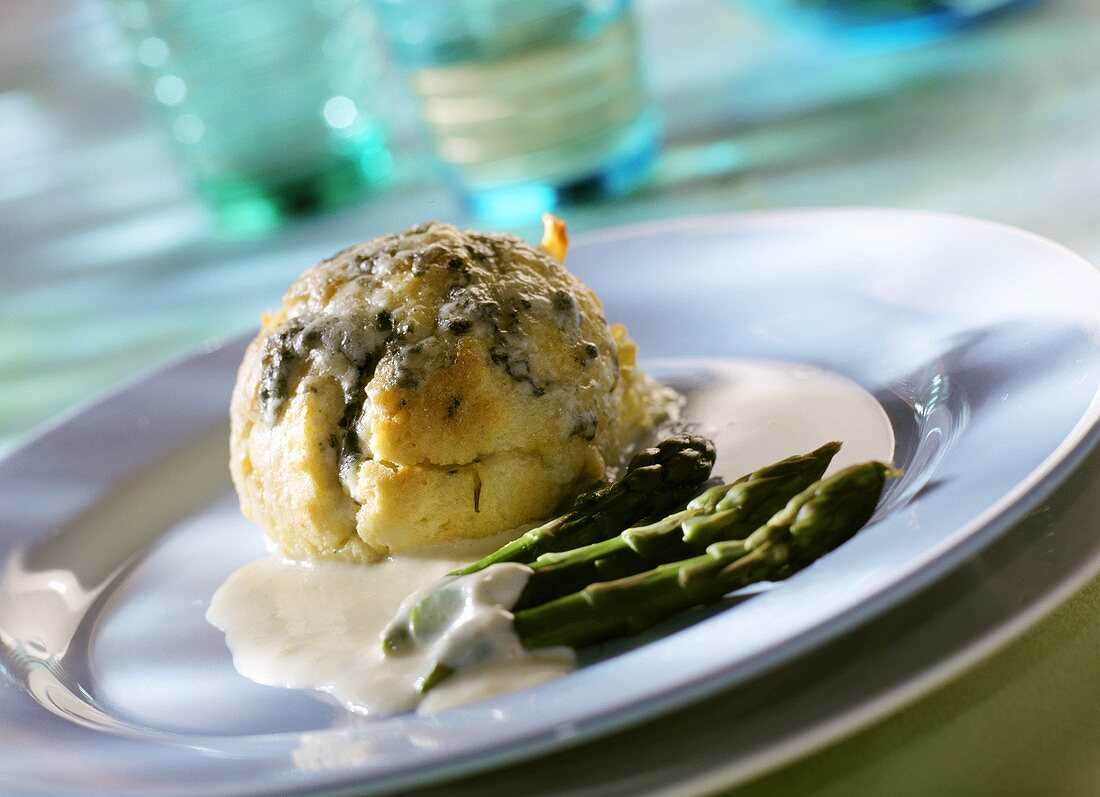Cheese souffle with green asparagus