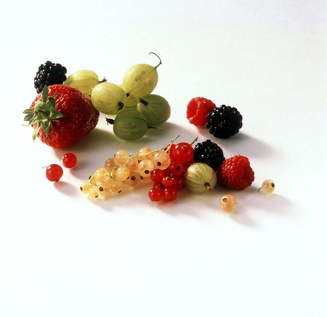 Various fresh berries on white background