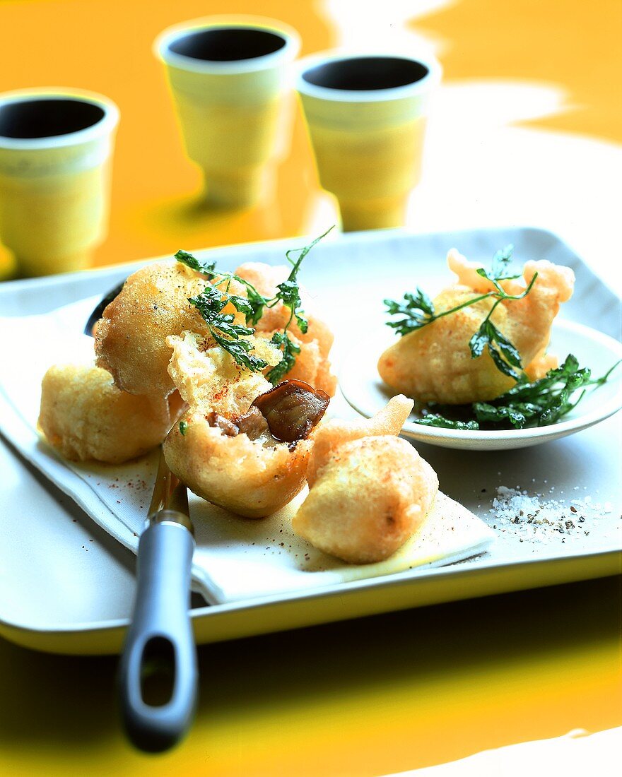 Snails in batter with deep-fried parsley