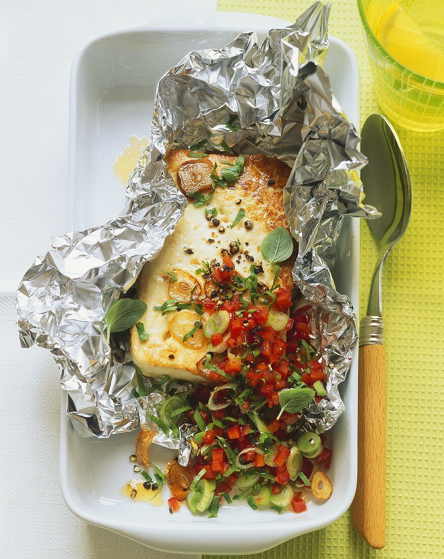 Baked sheep's cheese with pepper salsa in foil