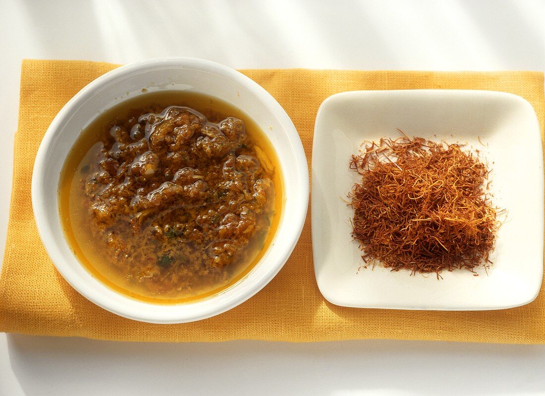 Canarian saffron sauce (Mojo de azafran) in bowl; saffron