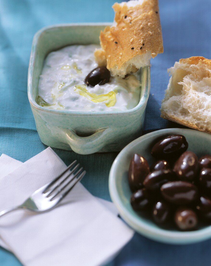 Cucumber & yoghurt mousse (Tzaziki) with olives & flat bread