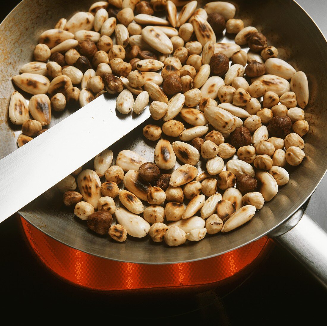Toasting almonds and hazelnuts