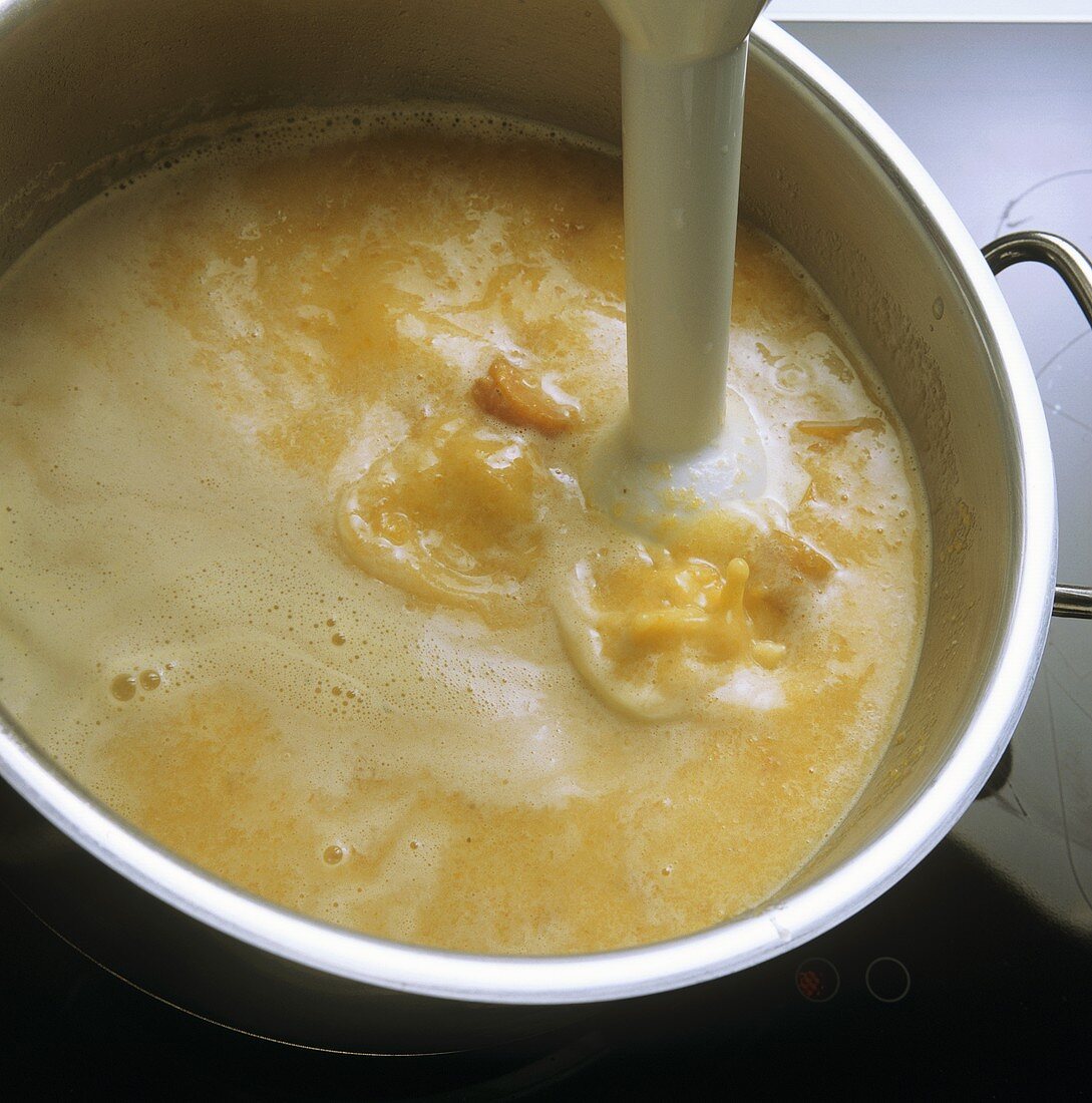 Beating cream into vegetable soup