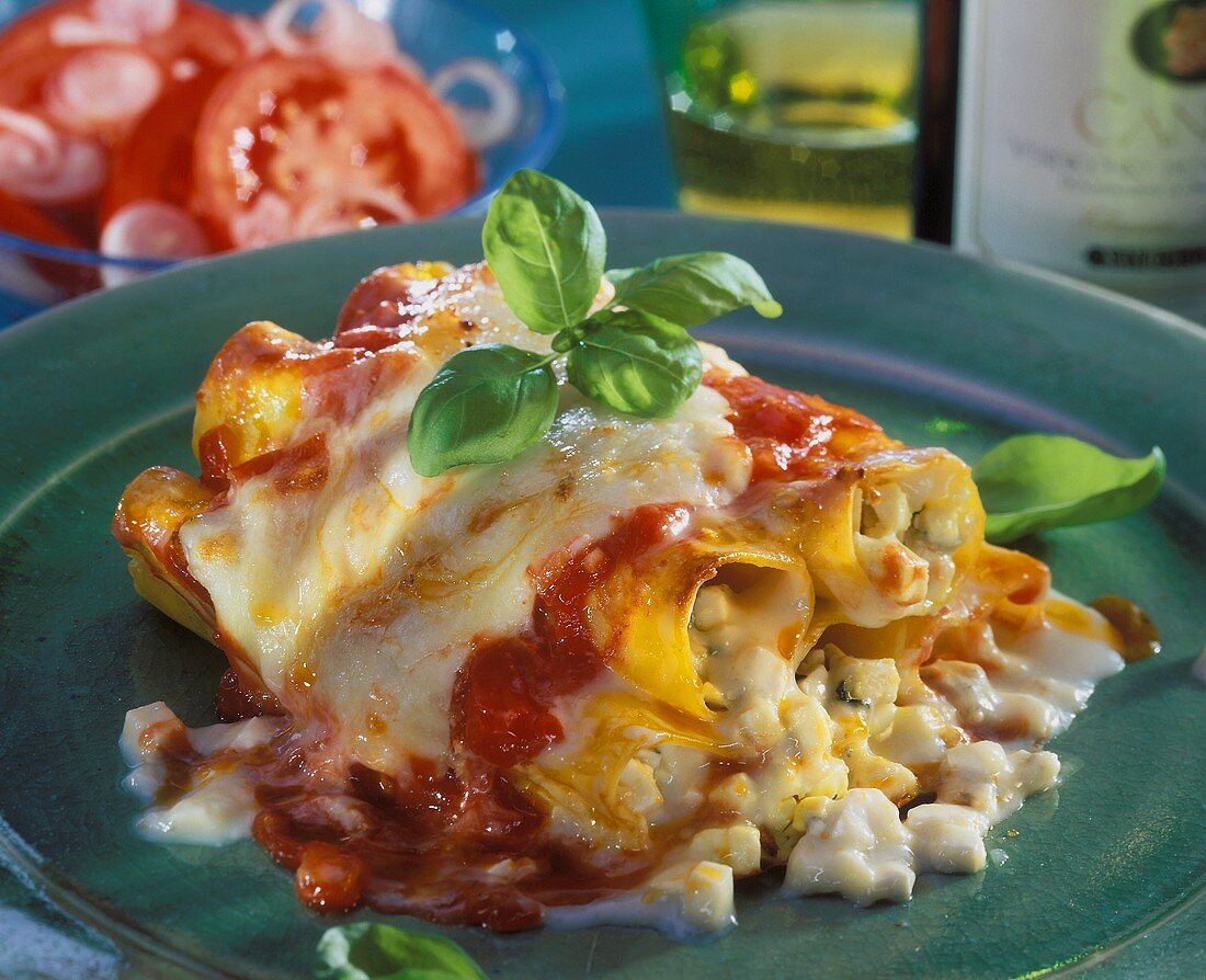 Cannelloni with three cheeses and tomato sauce