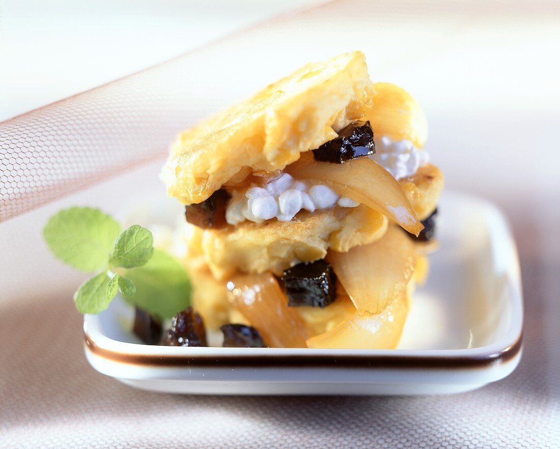 Corn cakes with onion confit and prunes