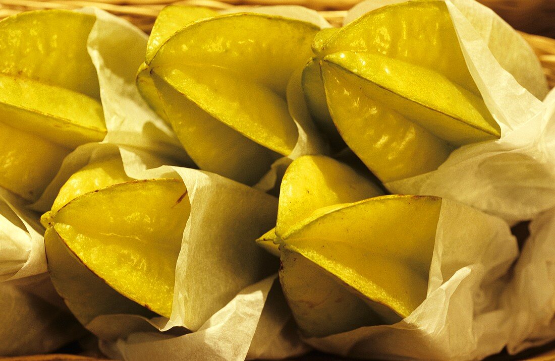 Carambolas (star fruit), packed in paper