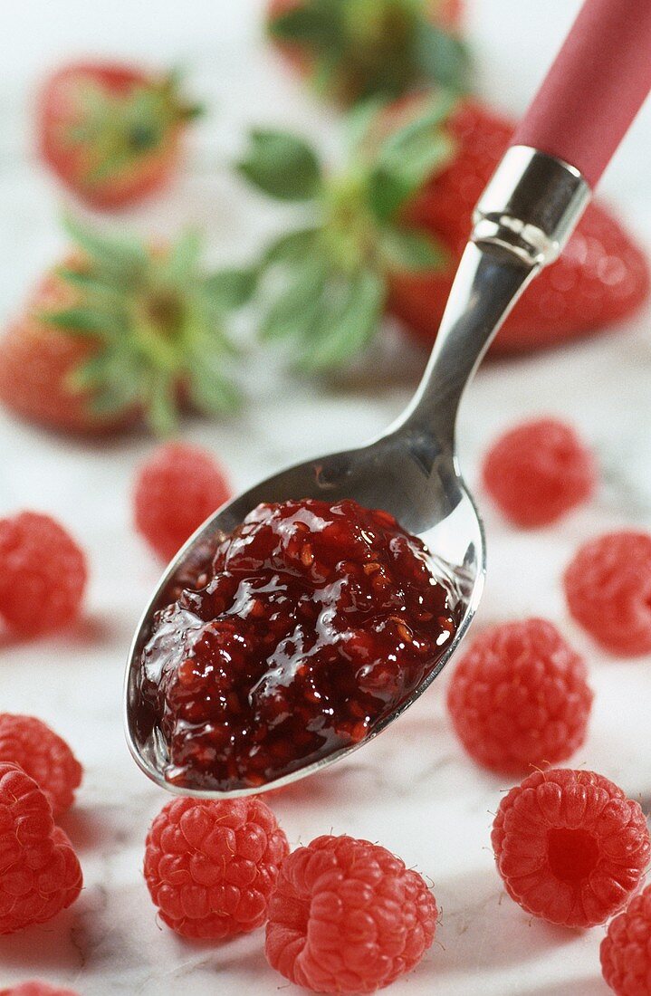 Raspberry jam on spoon
