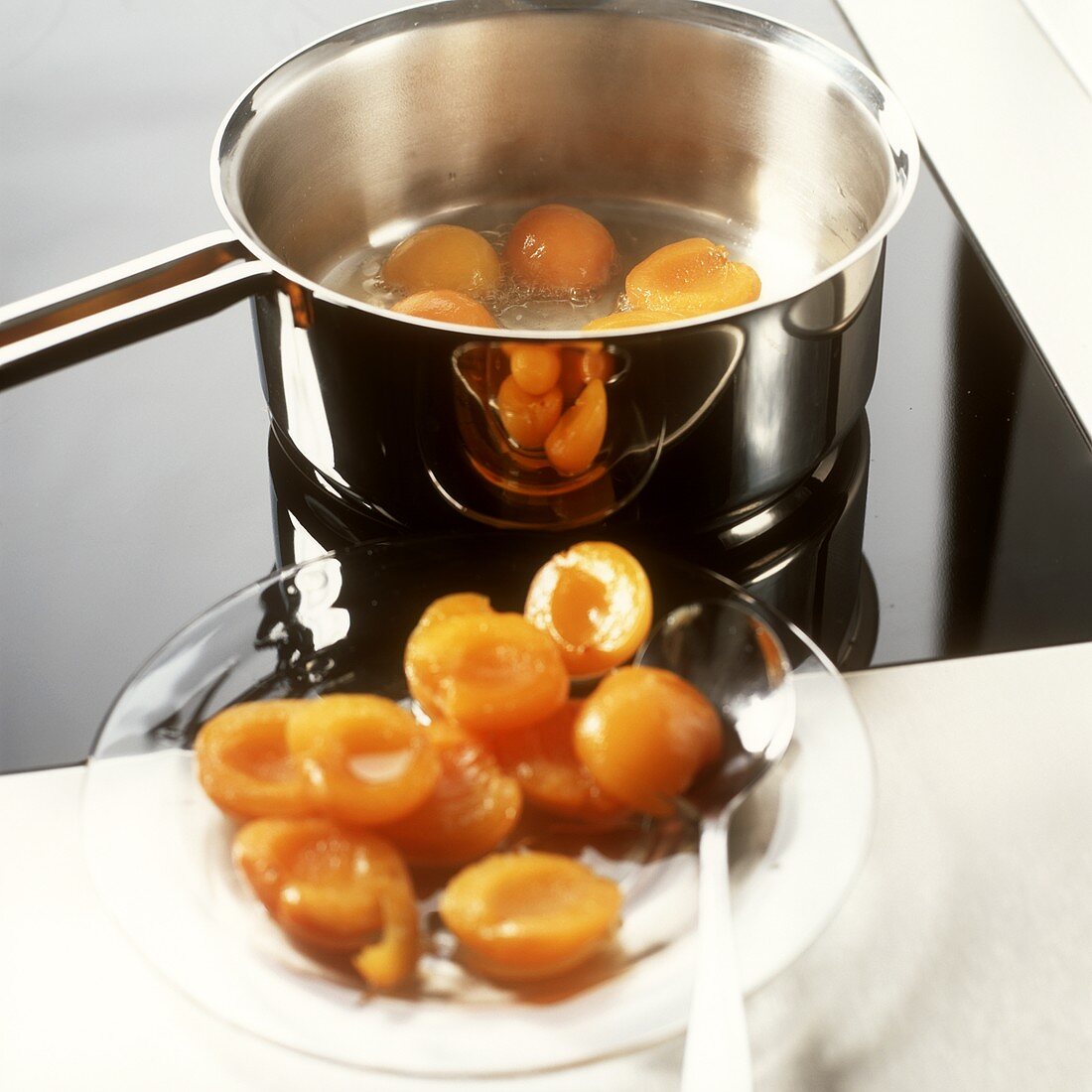 Poaching apricots in wine stock