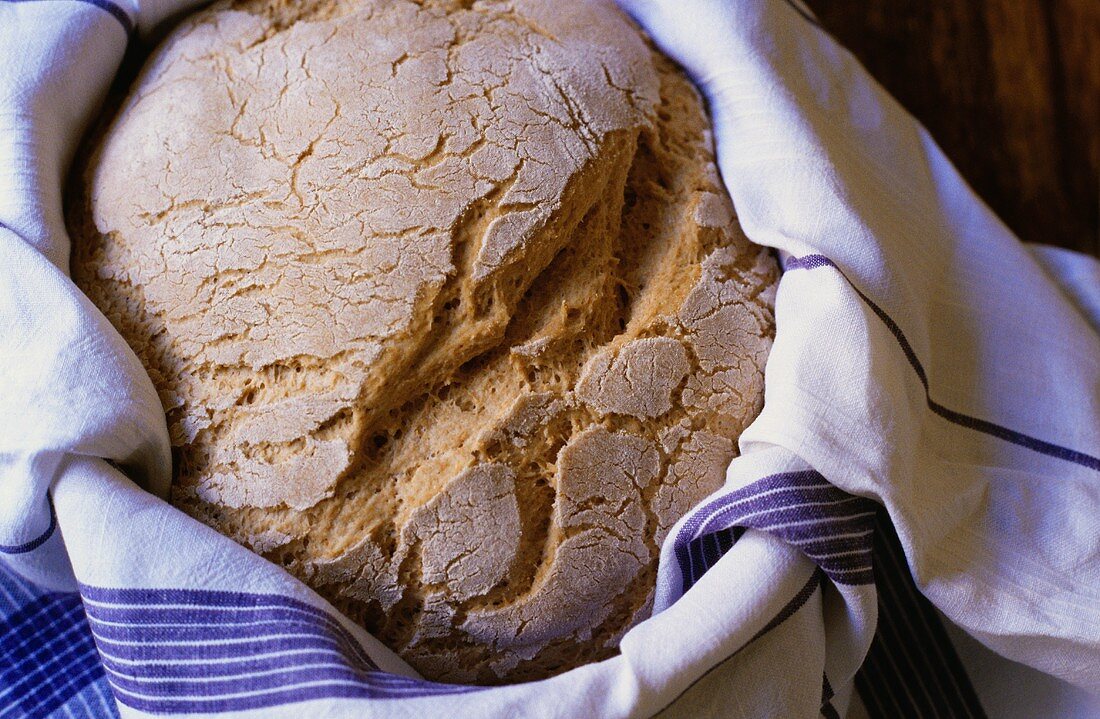Freshly baked bread in bread basket
