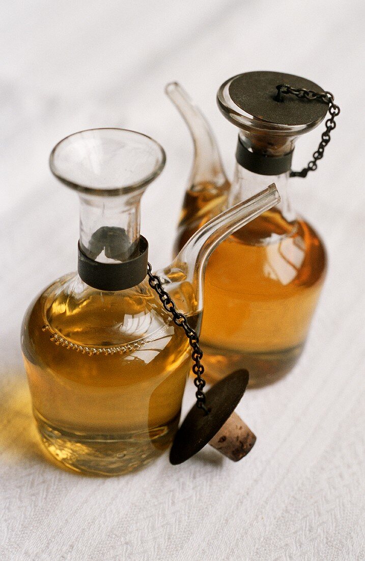 Walnut oil and hazelnut oil in glass jugs
