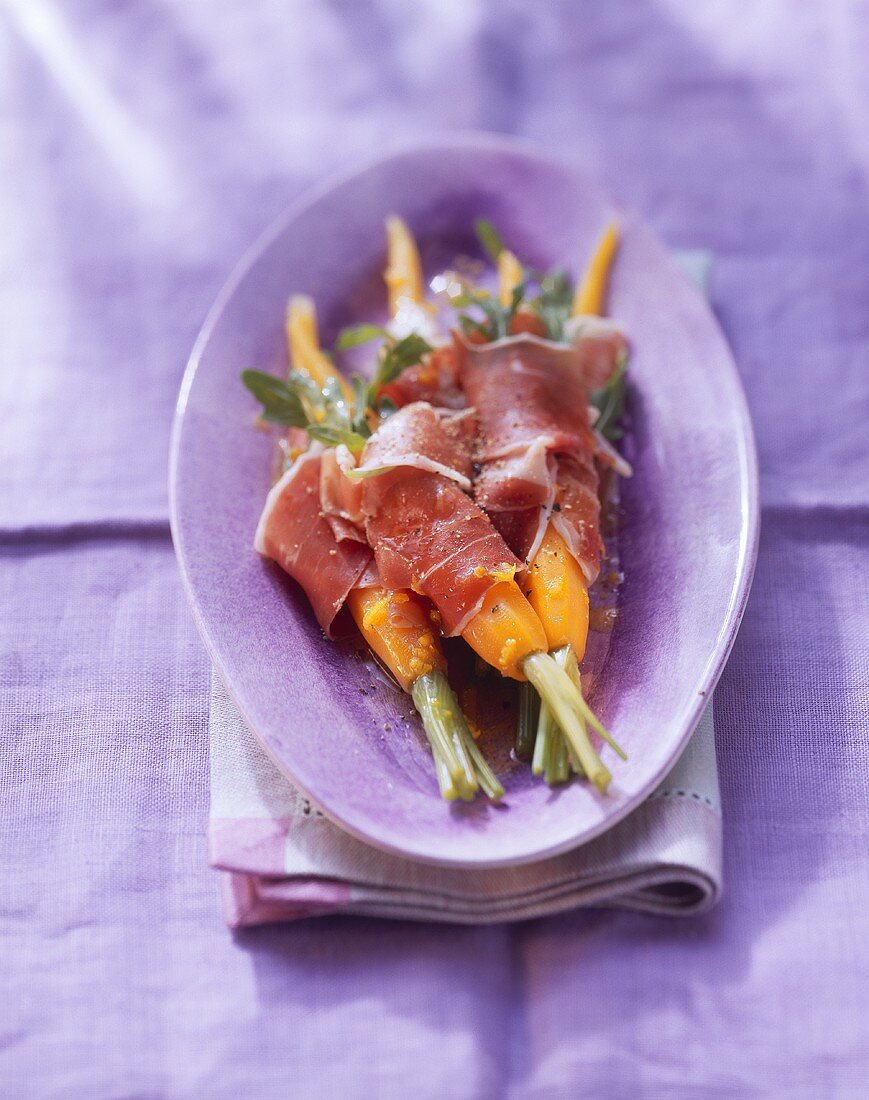 Rocket, ham & carrots on purple plate