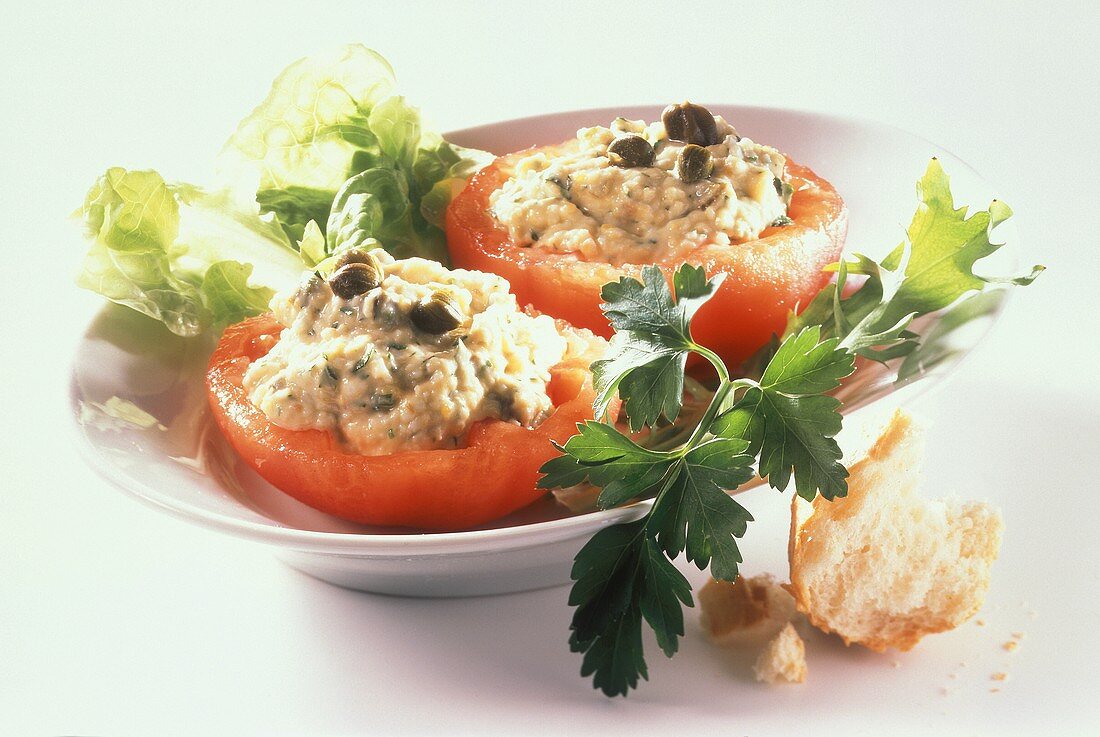 Stuffed tomatoes with caper mayonnaise; baguette