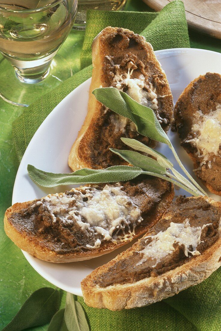 Crostini al fegato (toasted bread with liver spread & Parmesan)