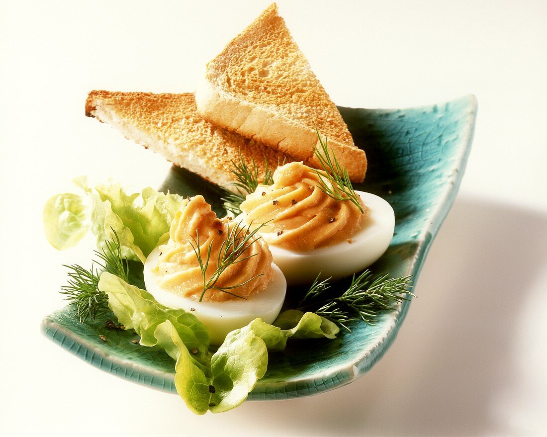 Swedish stinkhorn eggs with lettuce, dill and toast
