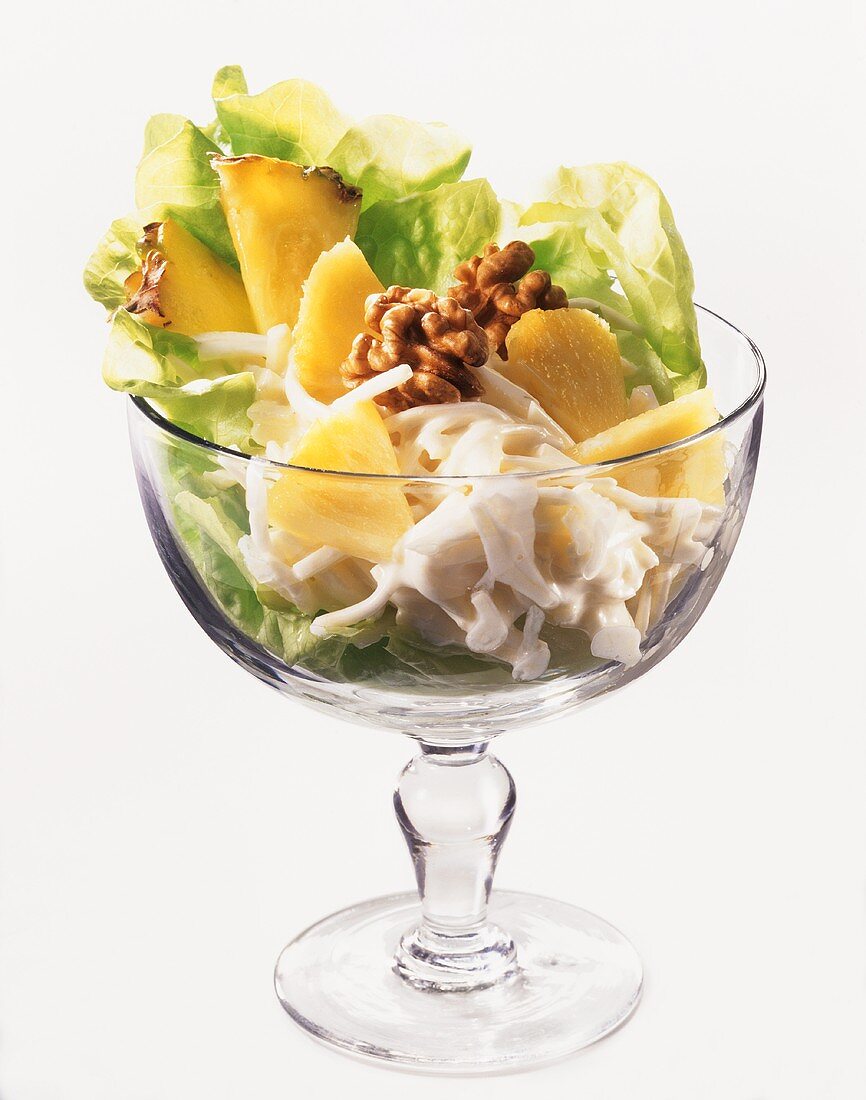 Waldorf salad with pineapple and walnut kernels