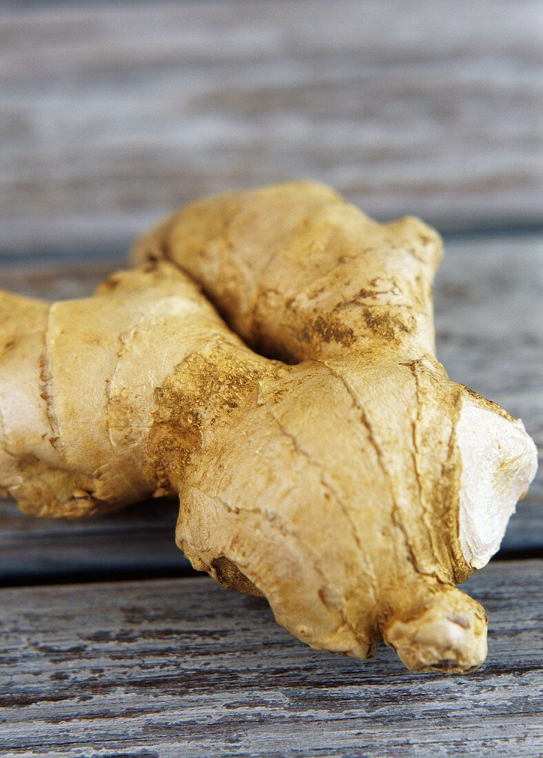 Ginger on wooden background