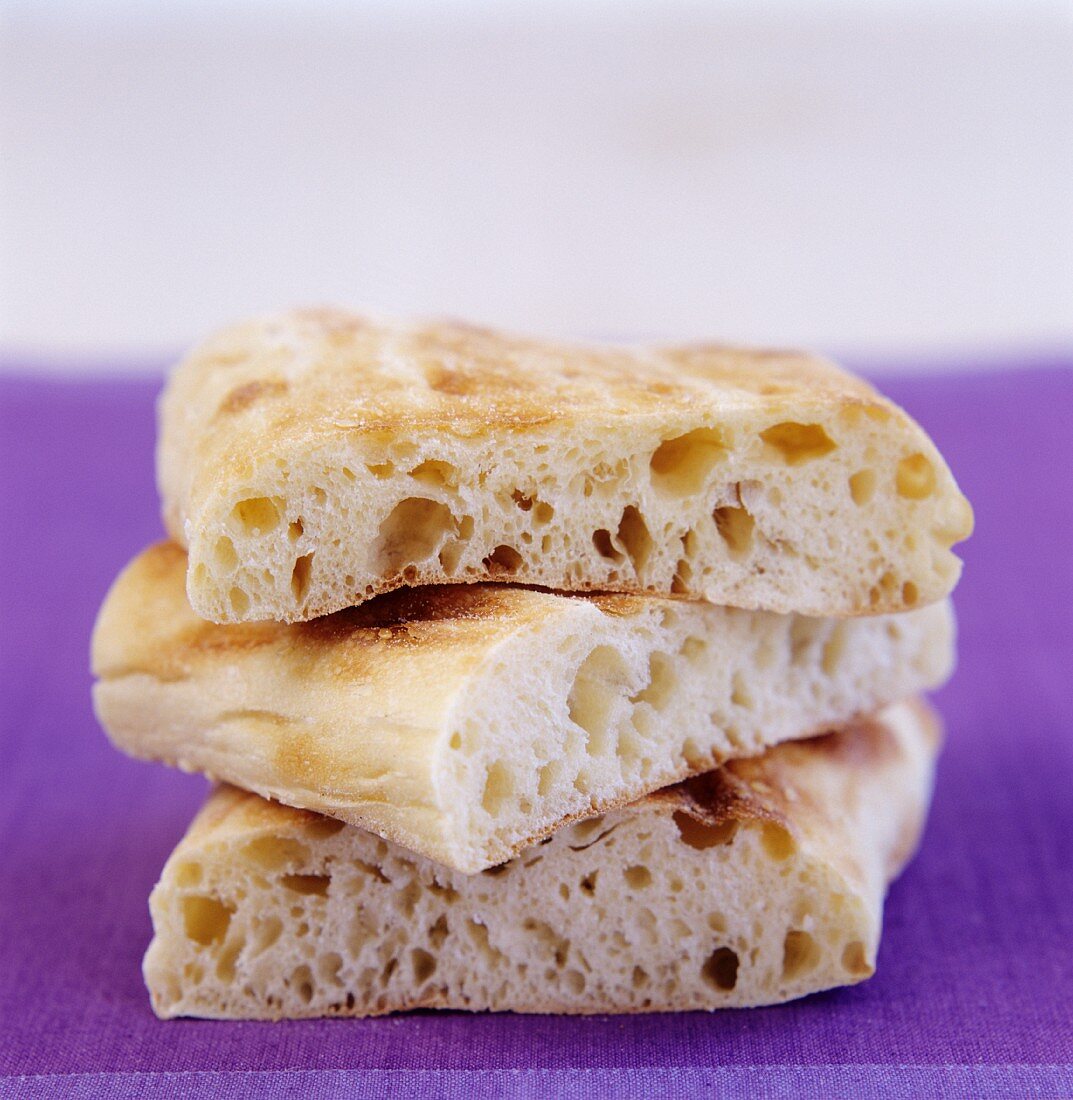 Three flat breads (in a pile)