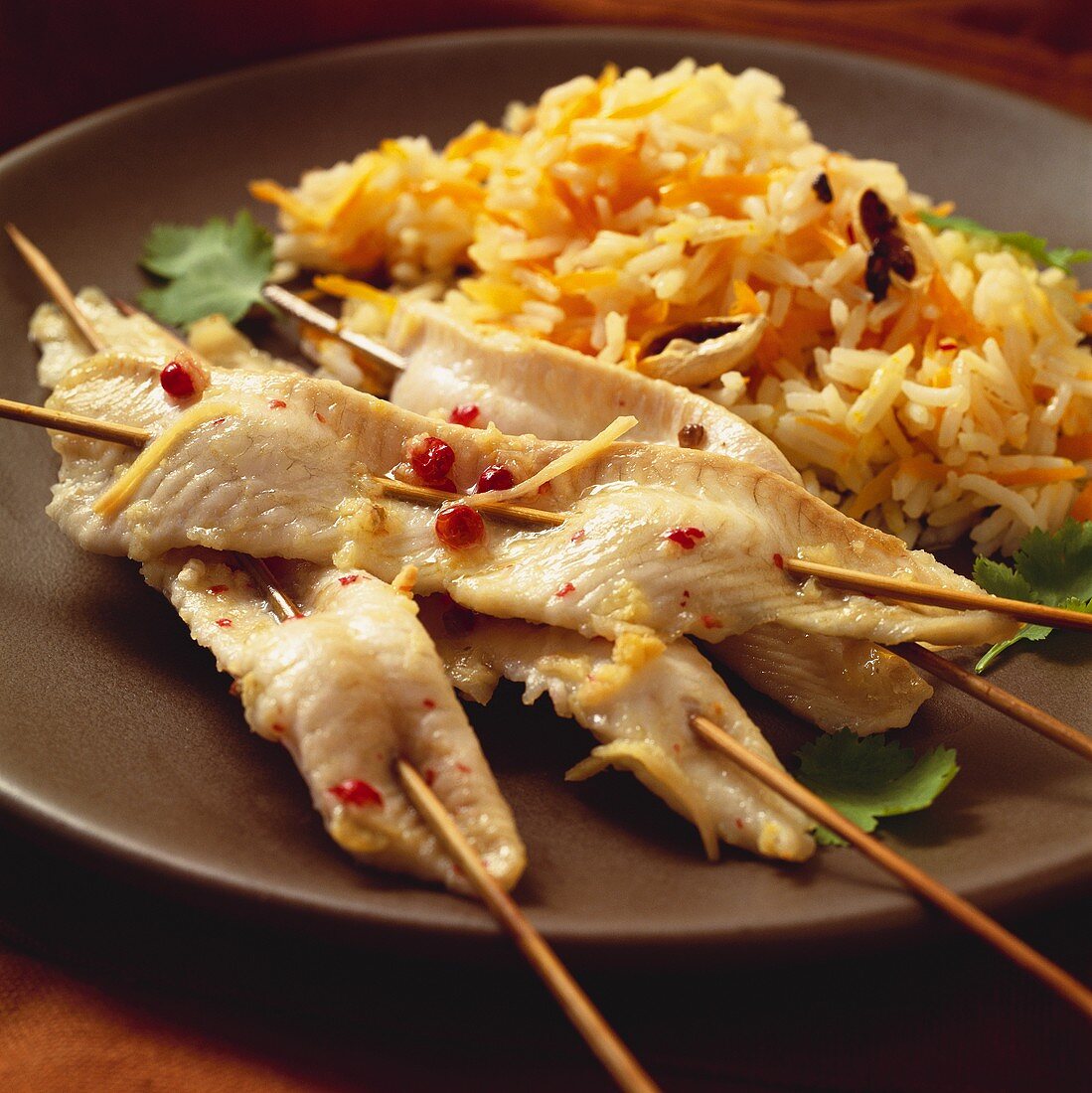 Sole fillet kebabs with pink pepper and rice