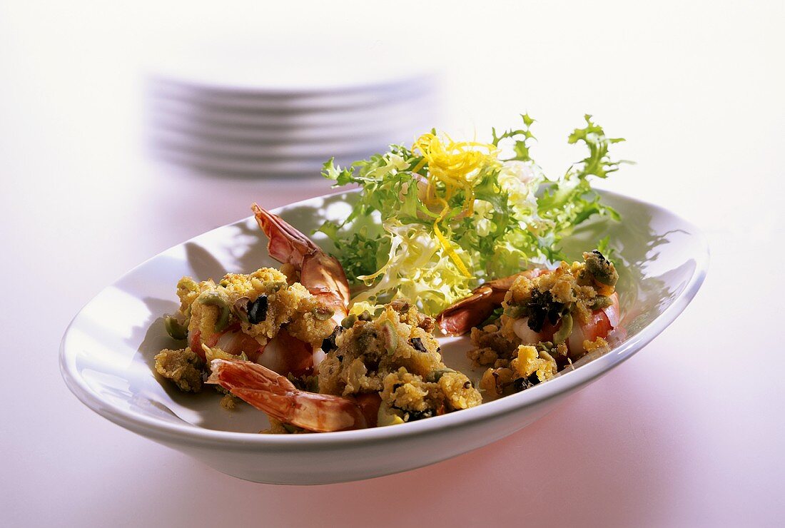 Barbecued scampi with olive and walnut crust and salad