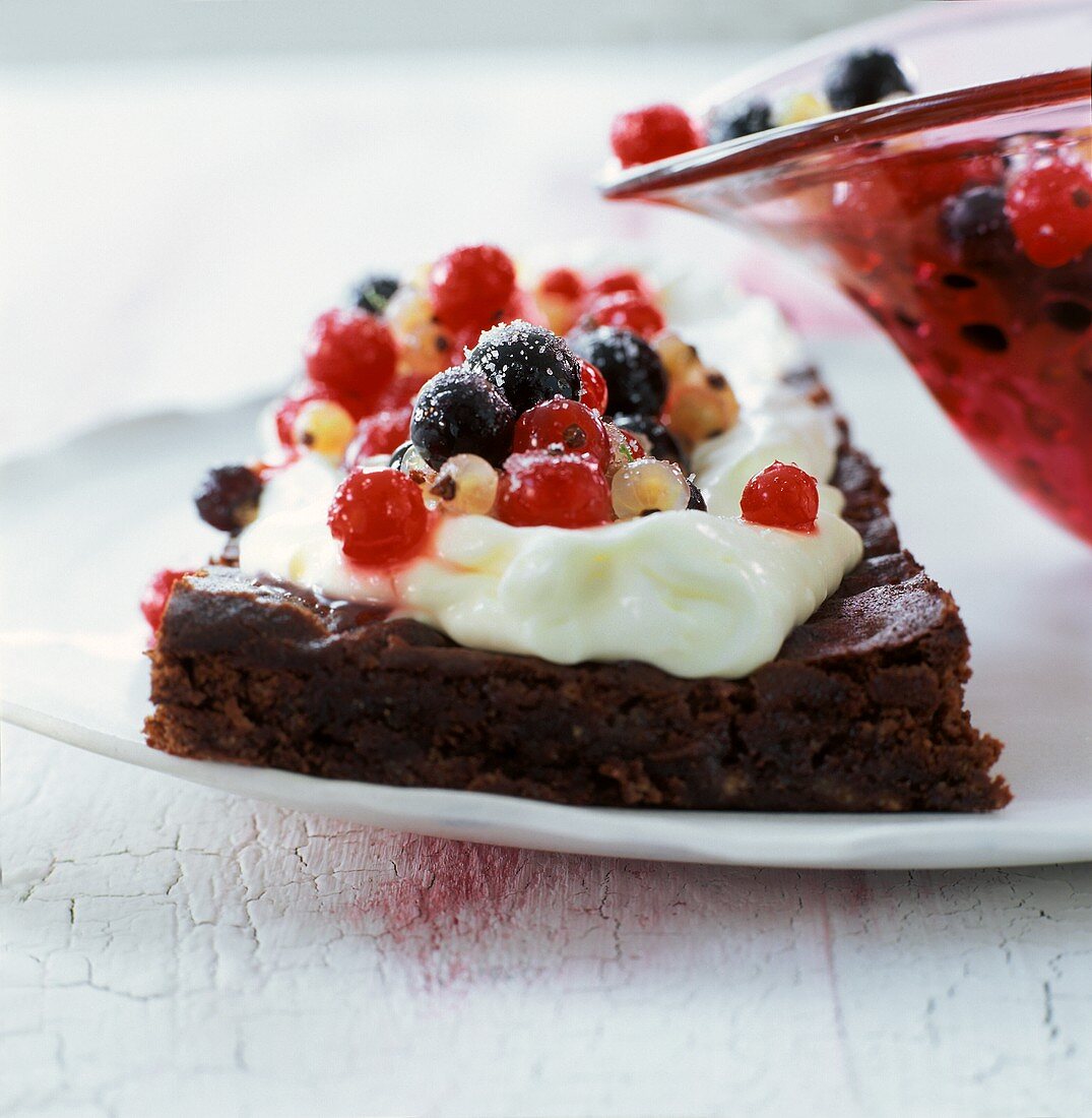 Piece of berry cake with cream
