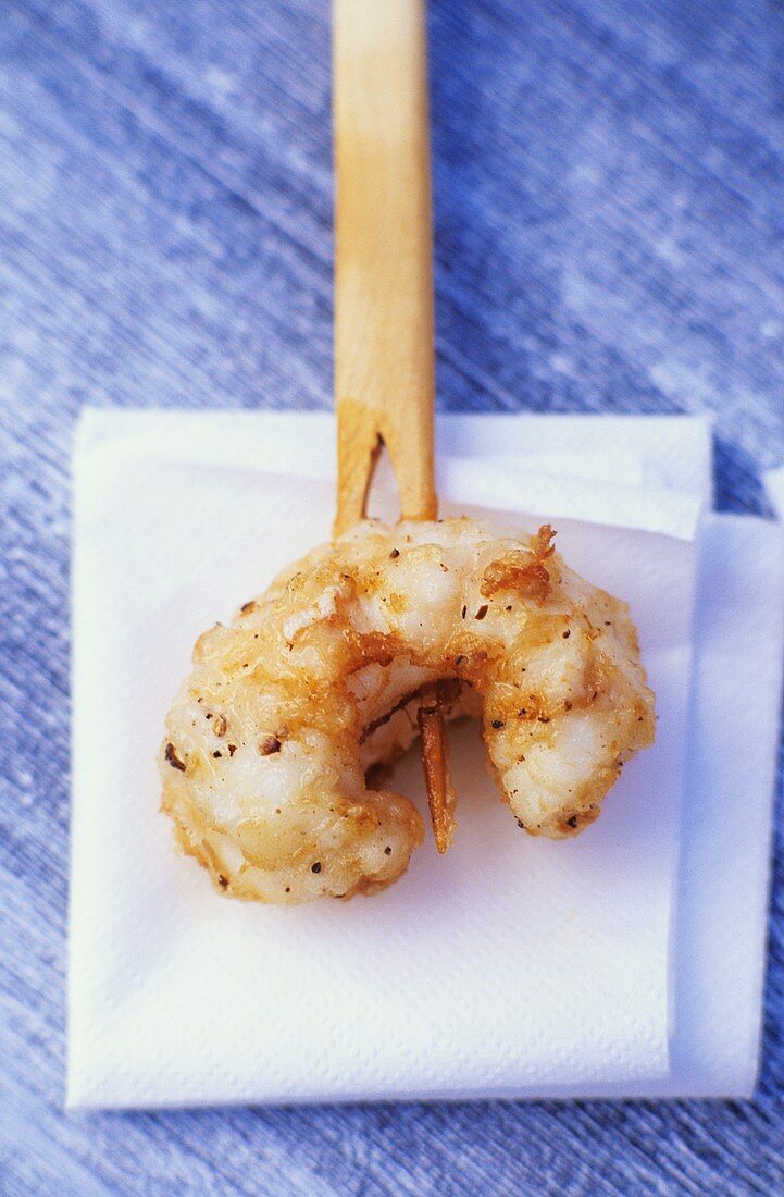Fried scampo on skewer