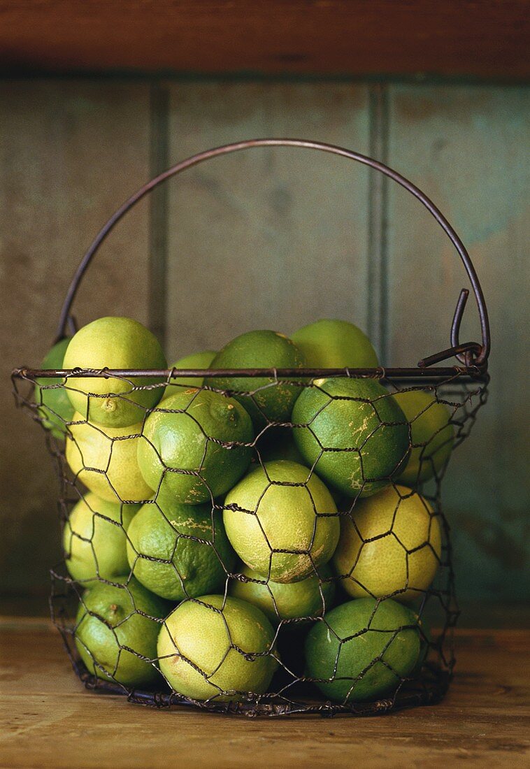 Limes in wire basket