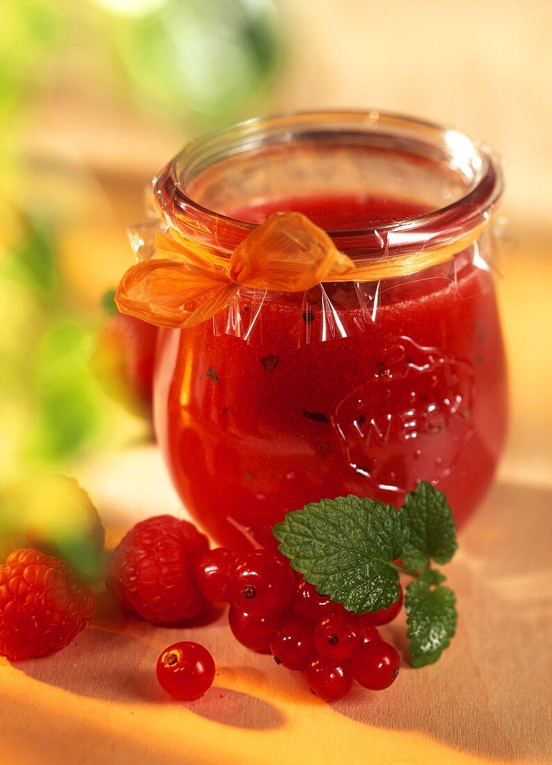 Strawberry jam with lemon balm in jar