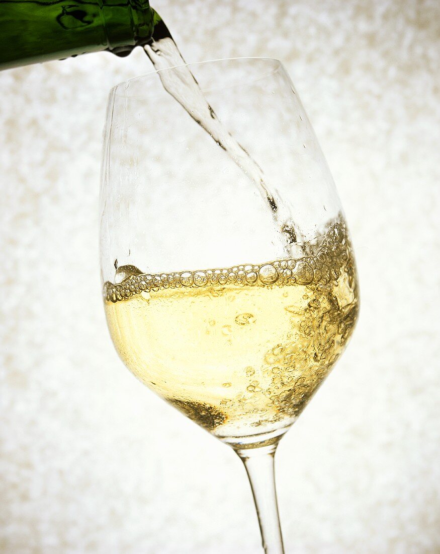 Pouring white wine