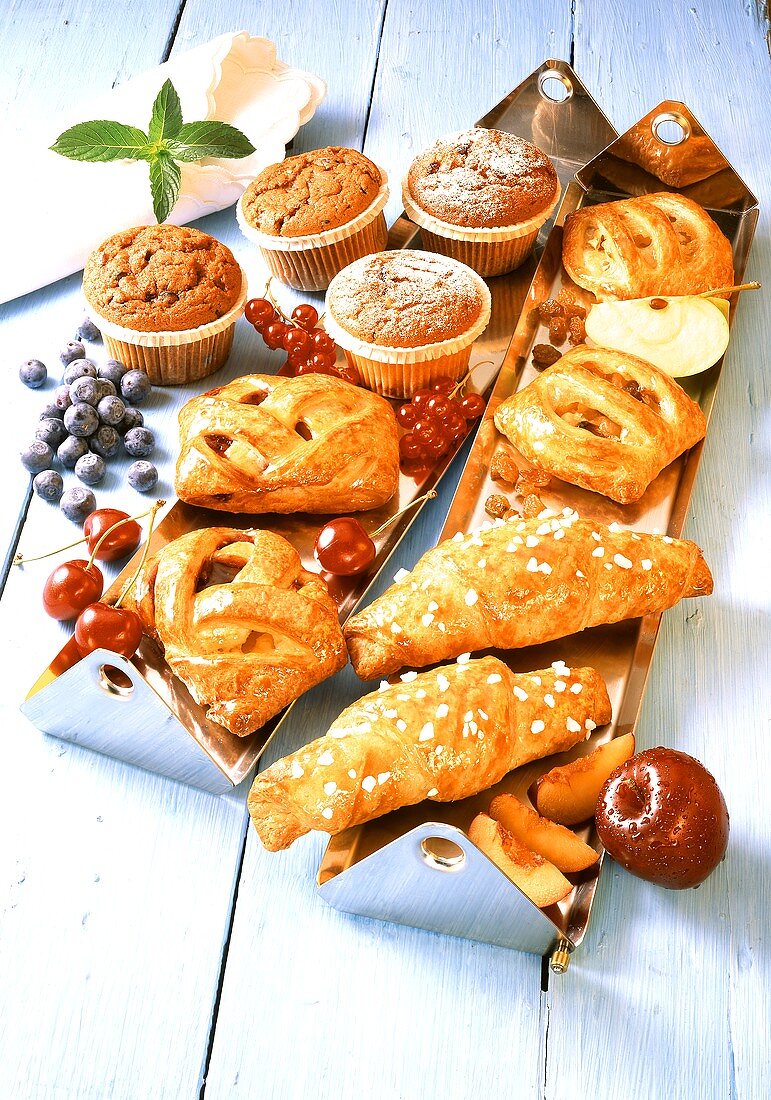 Assorted sweet pastries with fruit filling and muffins