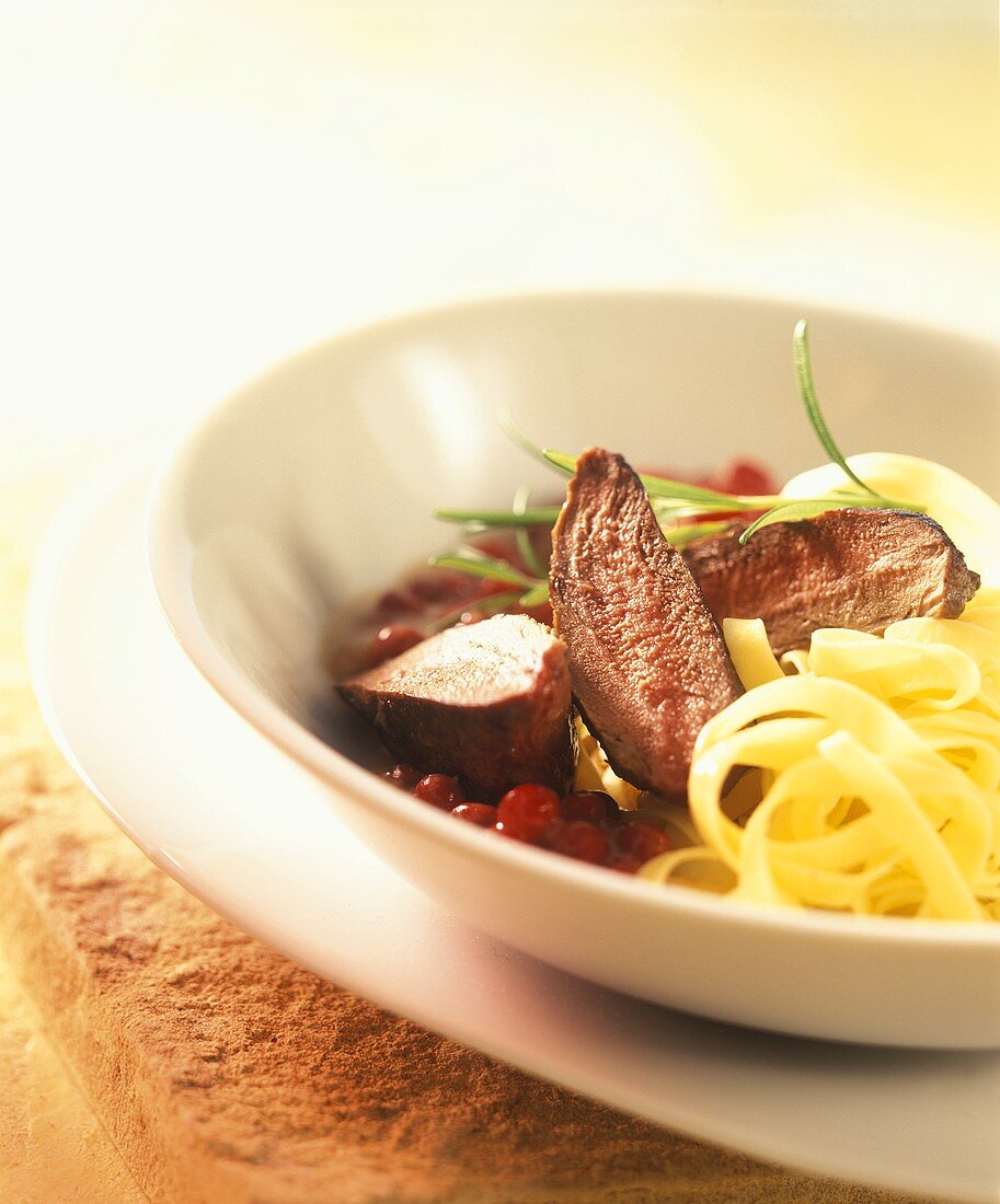 Venison noisettes with elderberry noodles & cranberries