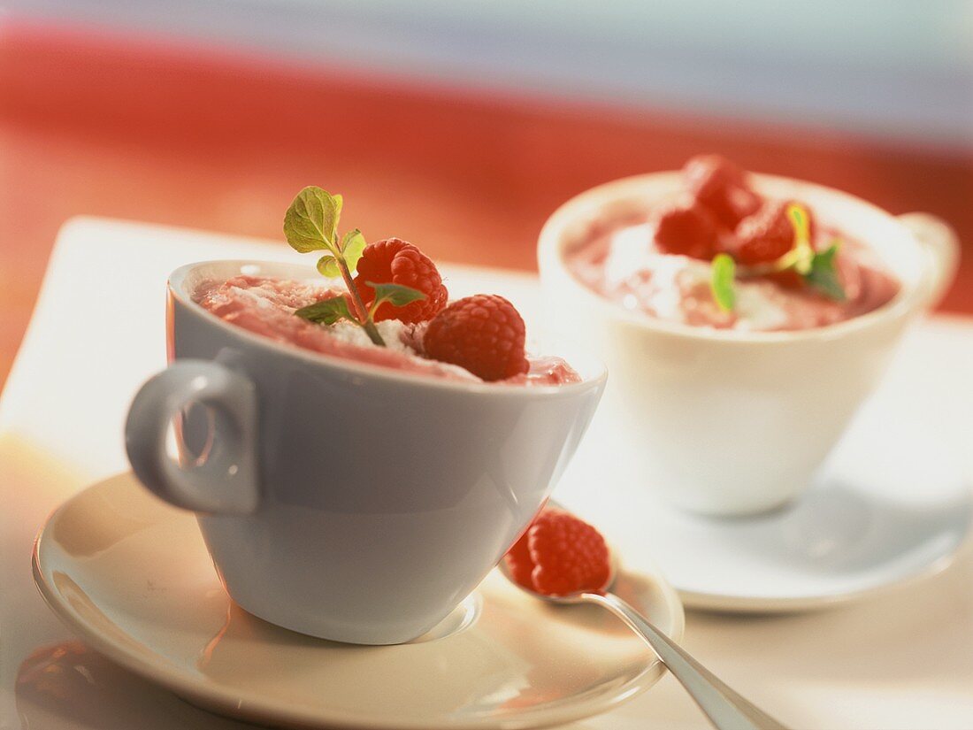 Raspberry tiramisu in coffee cups