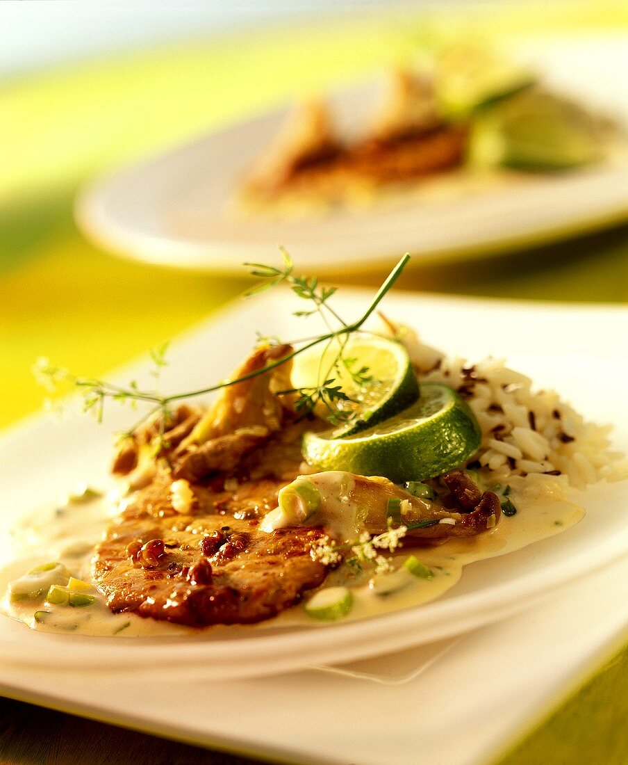 Kalbsschnitzel mit Limetten, Austernpilzen und Reis