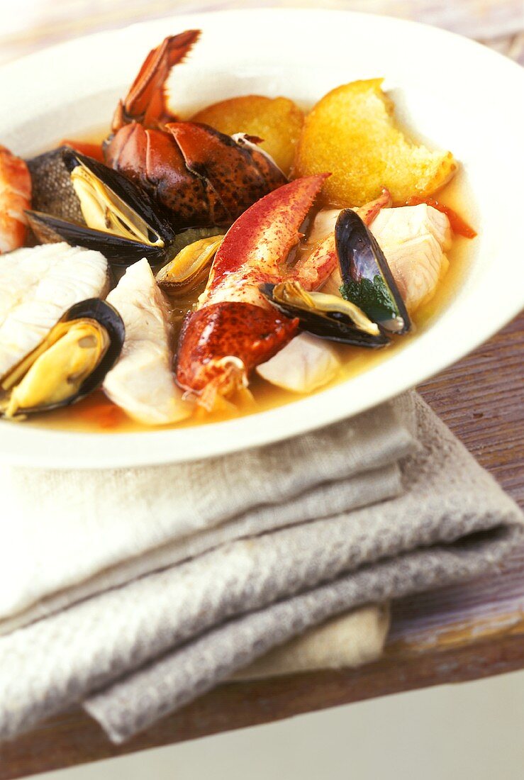 Kakavia (Greek fish soup) with white bread