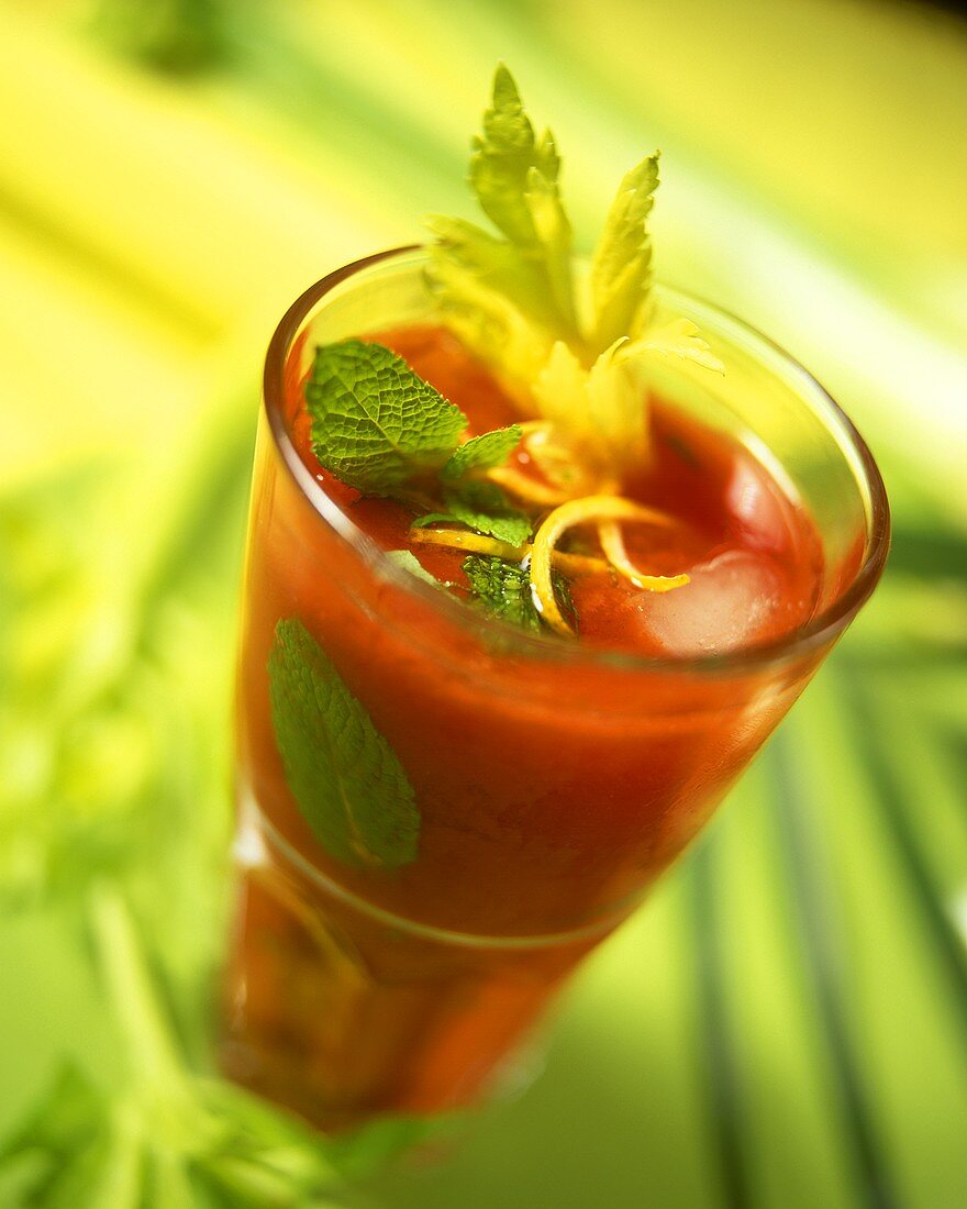 Tomato and celery drink with mint leaves