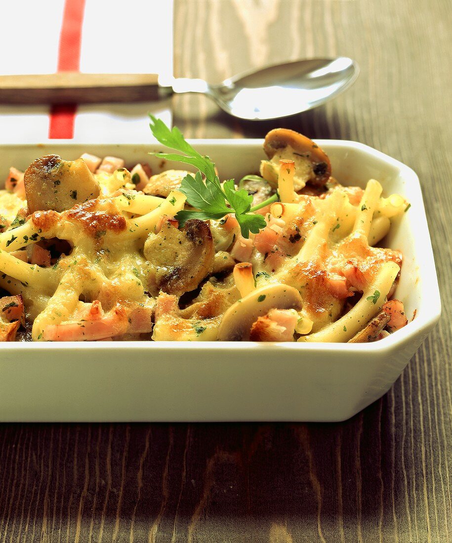 Pasta bake with mushrooms and turkey breast