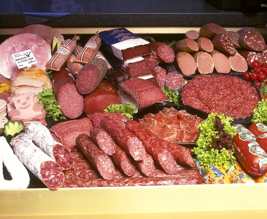 Sausage counter with many different types of sausage