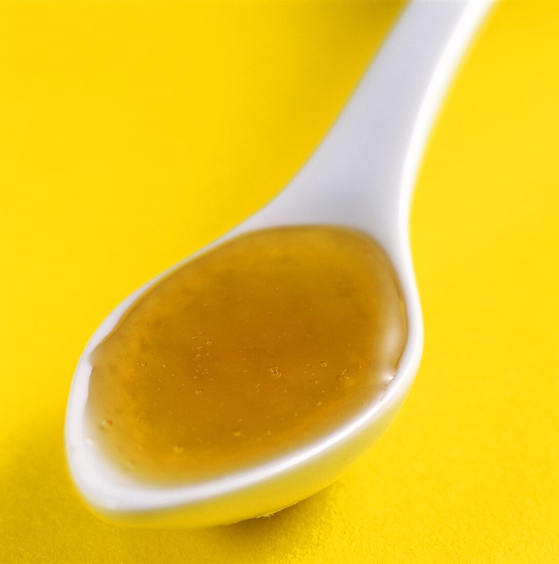 Honey on spoon