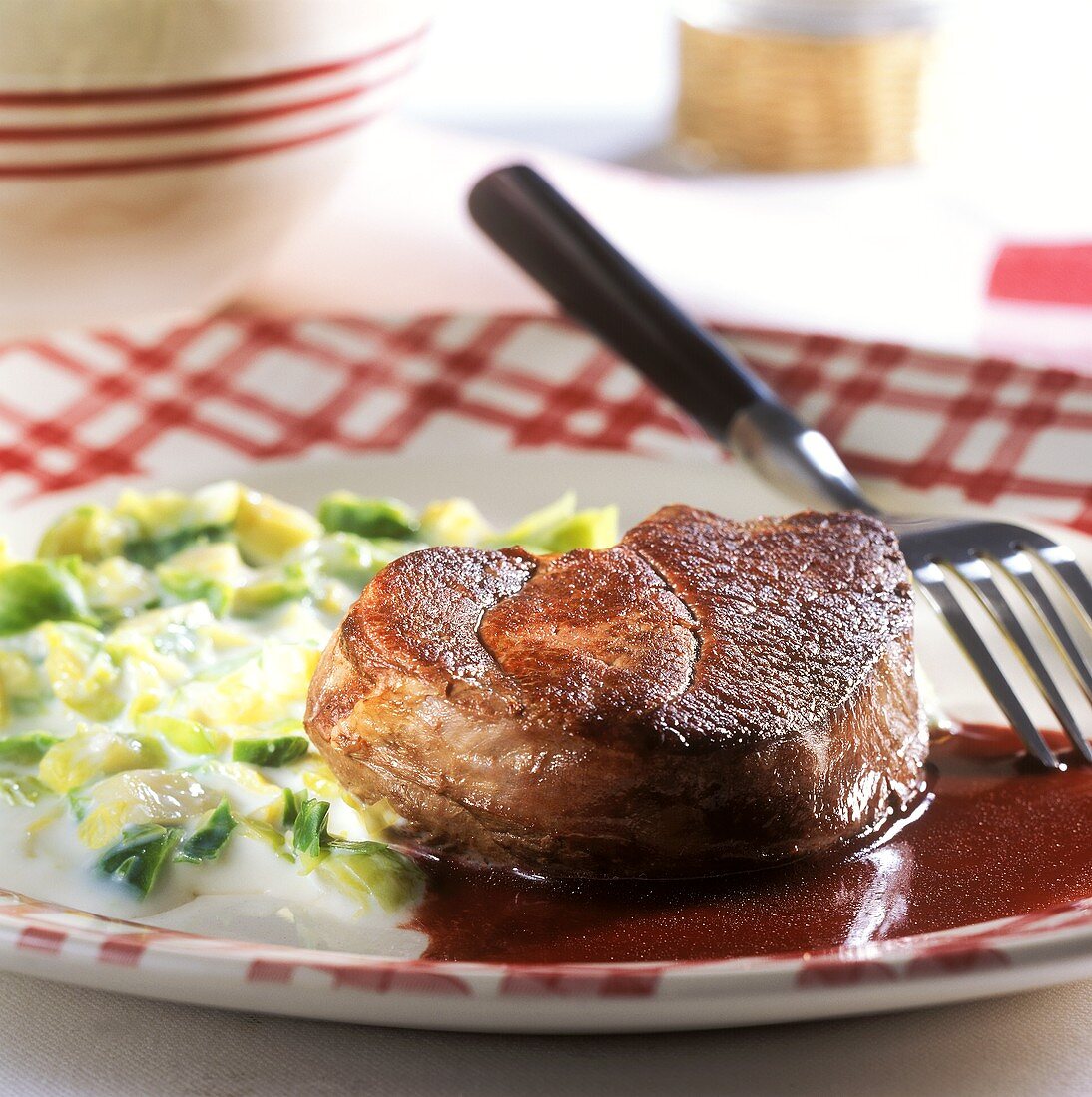 Venison steak with Brussels sprouts and red wine sauce