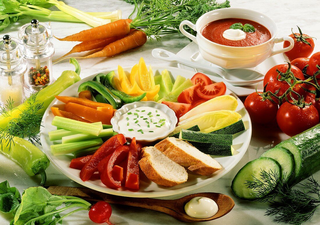 Raw vegetable salad with chive sauce; tomato soup; vegetables