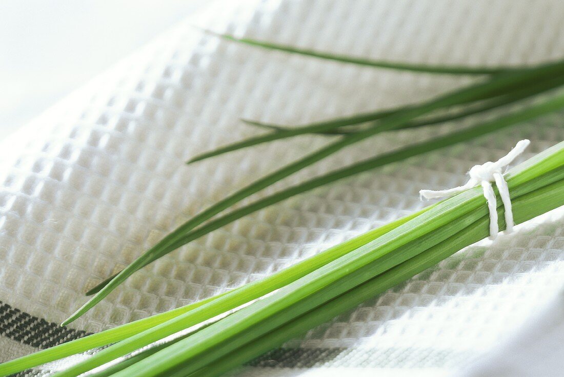 Fresh chives on tea towel