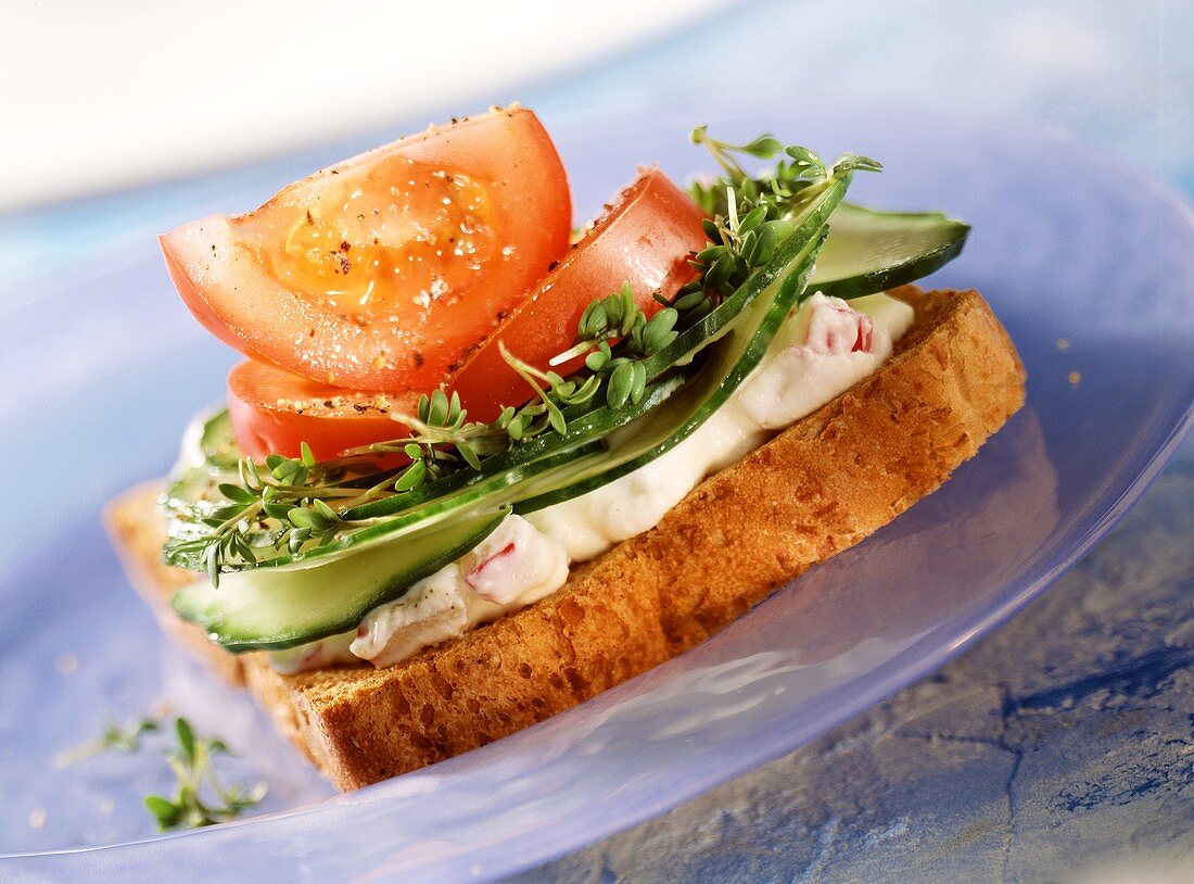 Wholemeal toast with soft cheese, cucumber, tomato & cress