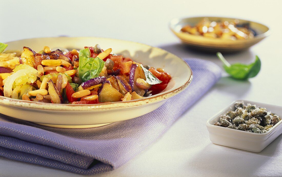 Caponata con i pinoli (aubergine stew with pine nuts)