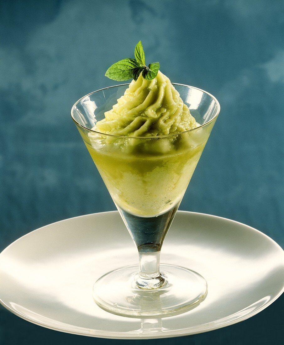 Basil sorbet with champagne in glass